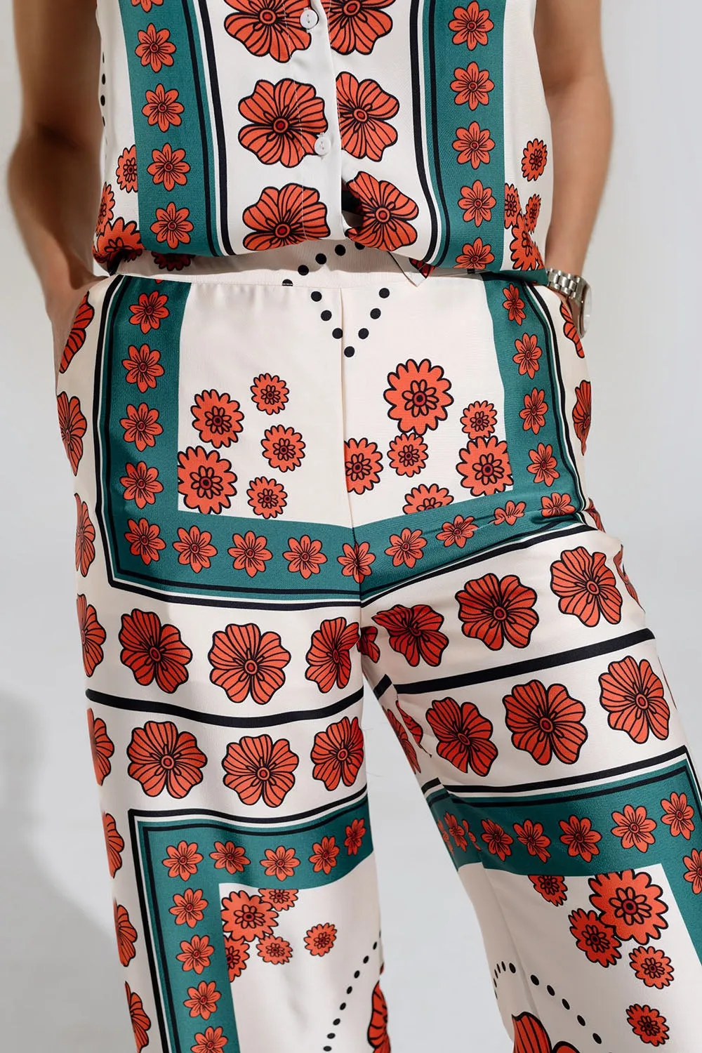 Satin Creme Flared Pants With Floral Design